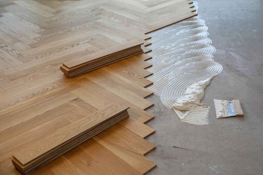 Pose de parquet avec colle